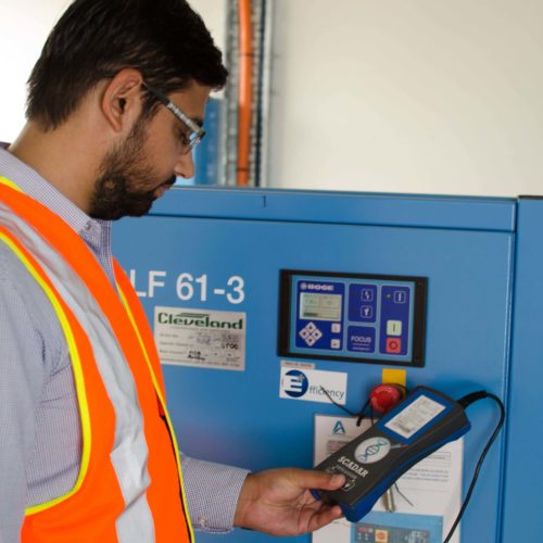 Man using an air compressor's plant management system
